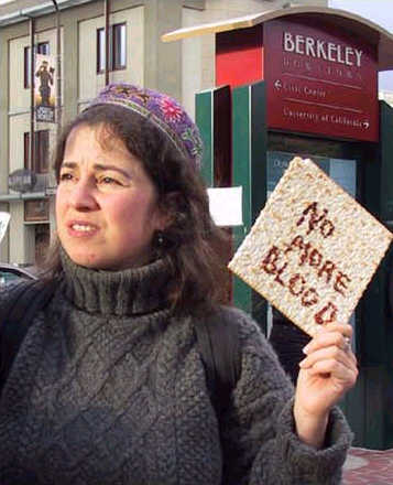 Woman holding matzah with 