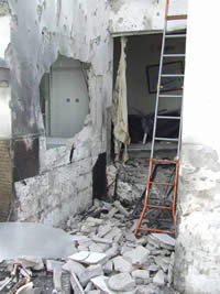 A house in Sderot destroyed by a direct rocket hit
(Sderot security staff, May 16)
